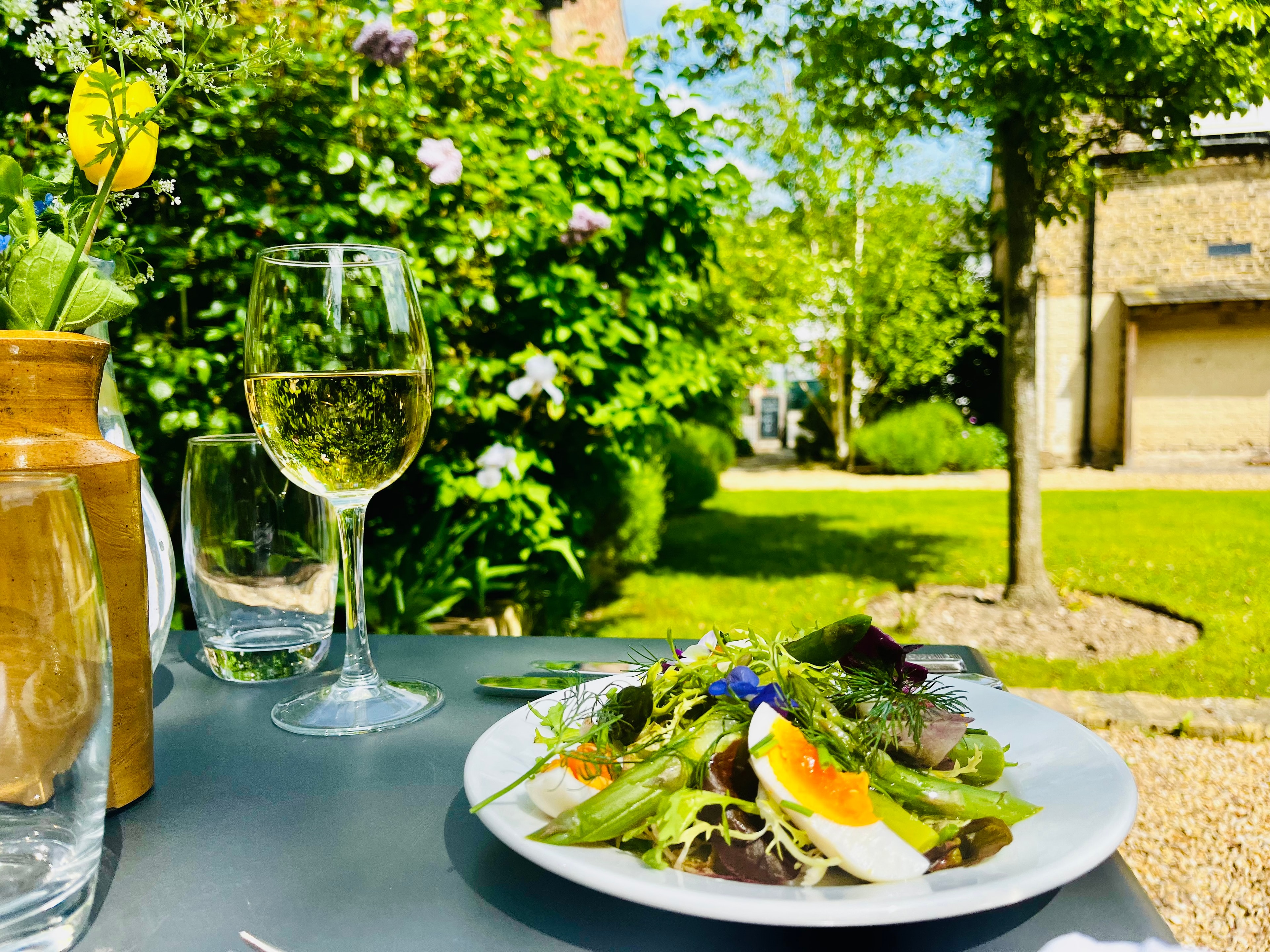 Garden lunch with salad and white wine at The Red Lion