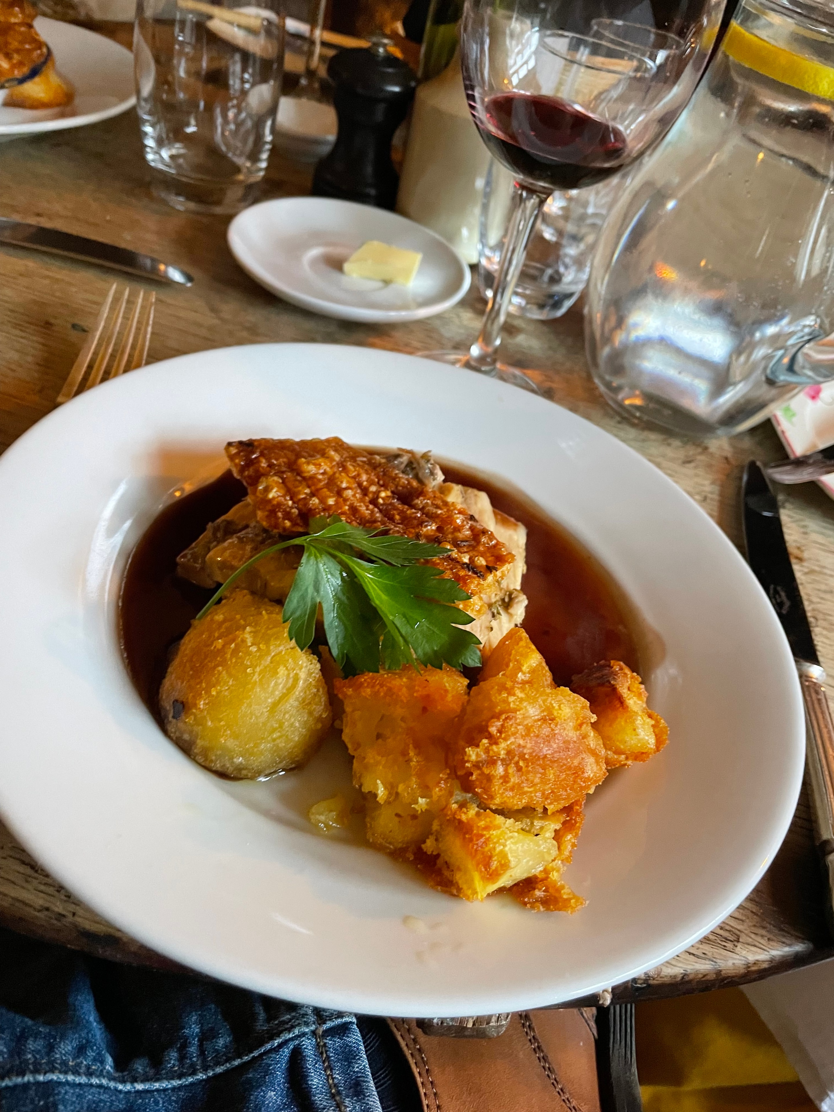 Guest photo: slow-braised duck leg with roast potatoes and red wine at The Red Lion, Soham