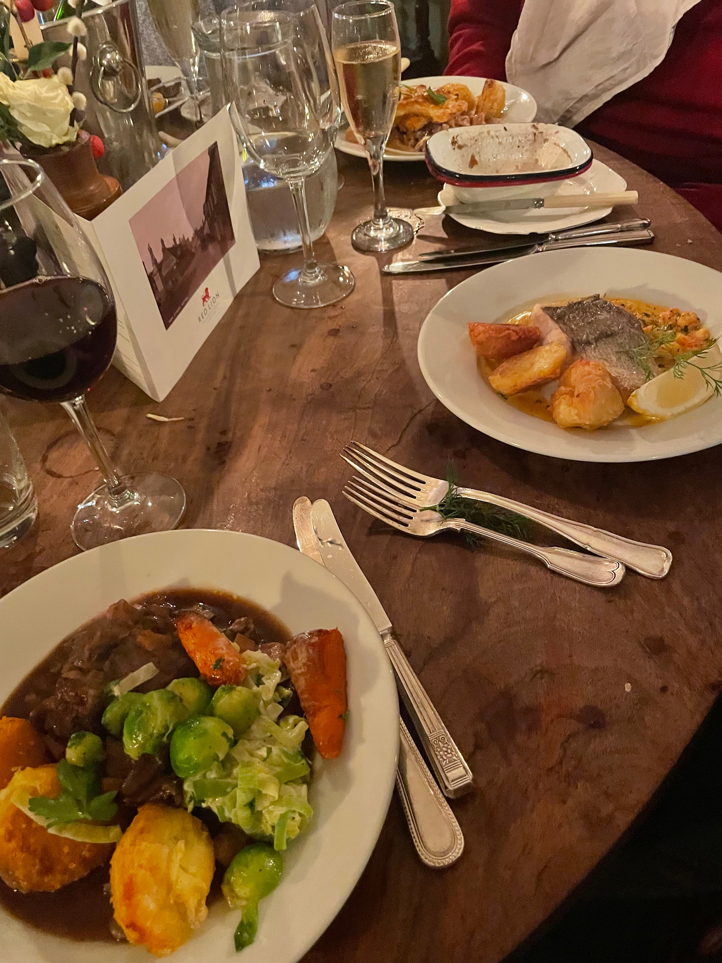 Guest photo: pan-fried sea bass and braised beef with seasonal vegetables at The Red Lion, Soham
