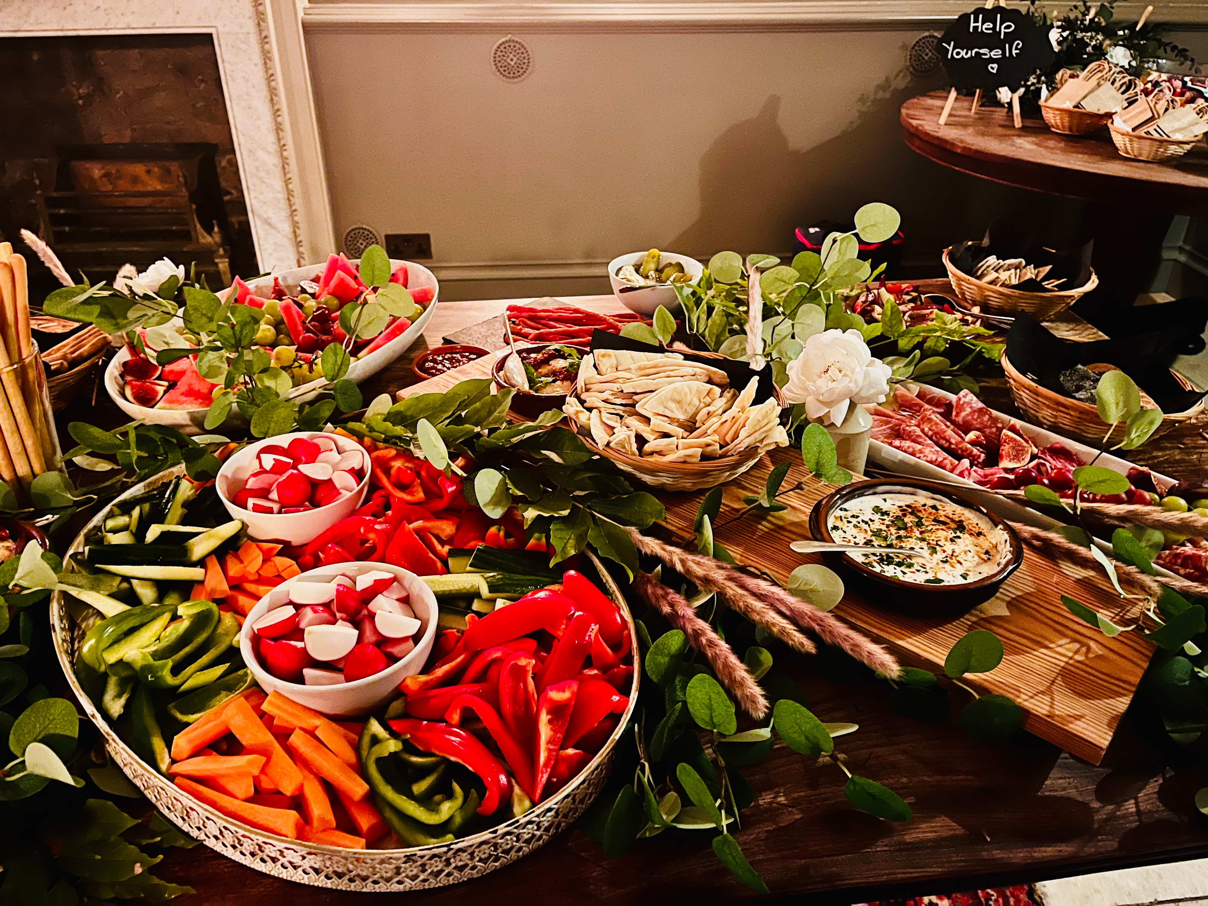 Grazing table with fresh vegetables, dips and charcuterie at The Red Lion